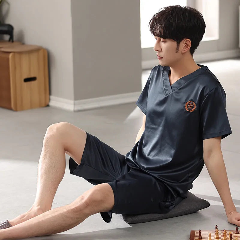 Men's ice silk loose-fit pajama set with short sleeve shirt and matching shorts in cooling fabric