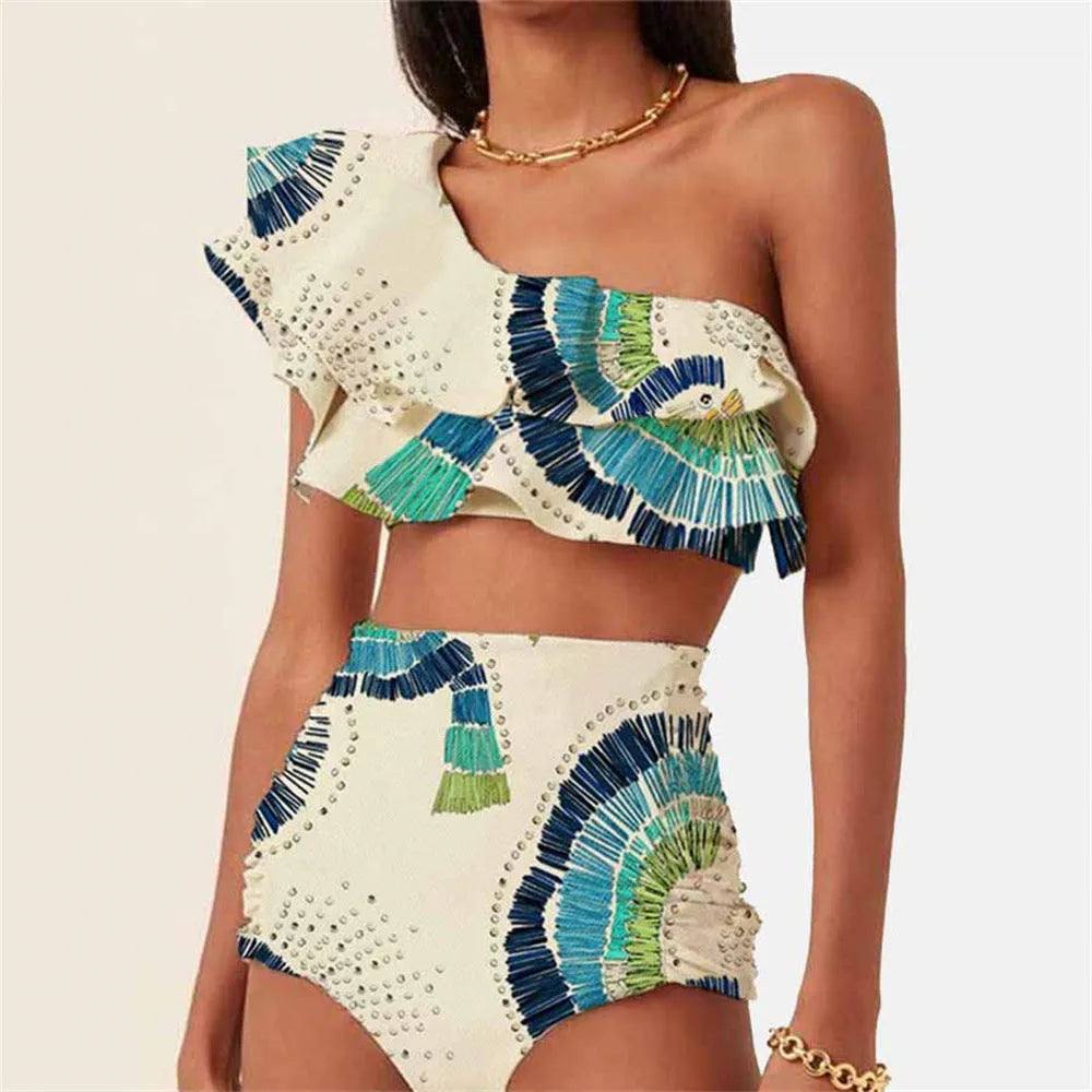White women's one-shoulder swimsuit showing double-layer lotus leaf detail and a high side leg split.