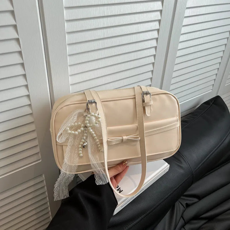 PU leather single-shoulder flap bag in urban simplicity style with bow stitching decoration