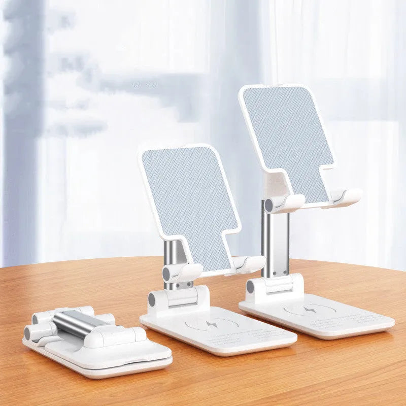 Black wireless charging phone desk stand holding a mobile phone at an angle.
