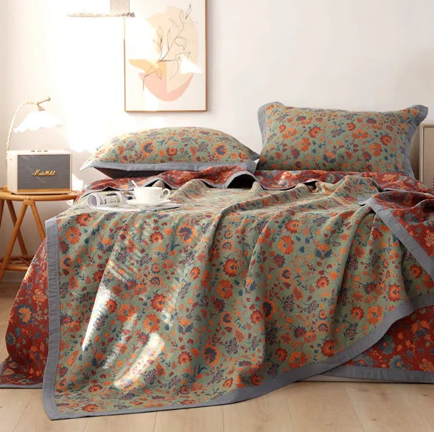Cotton gauze three-piece bedding set with botanical plant and flower patterns including blanket and two pillowcases