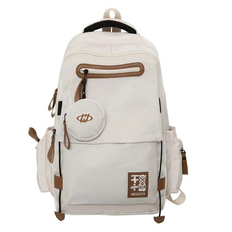 Large nylon backpack for middle school students with curved shoulder straps in solid colour options
