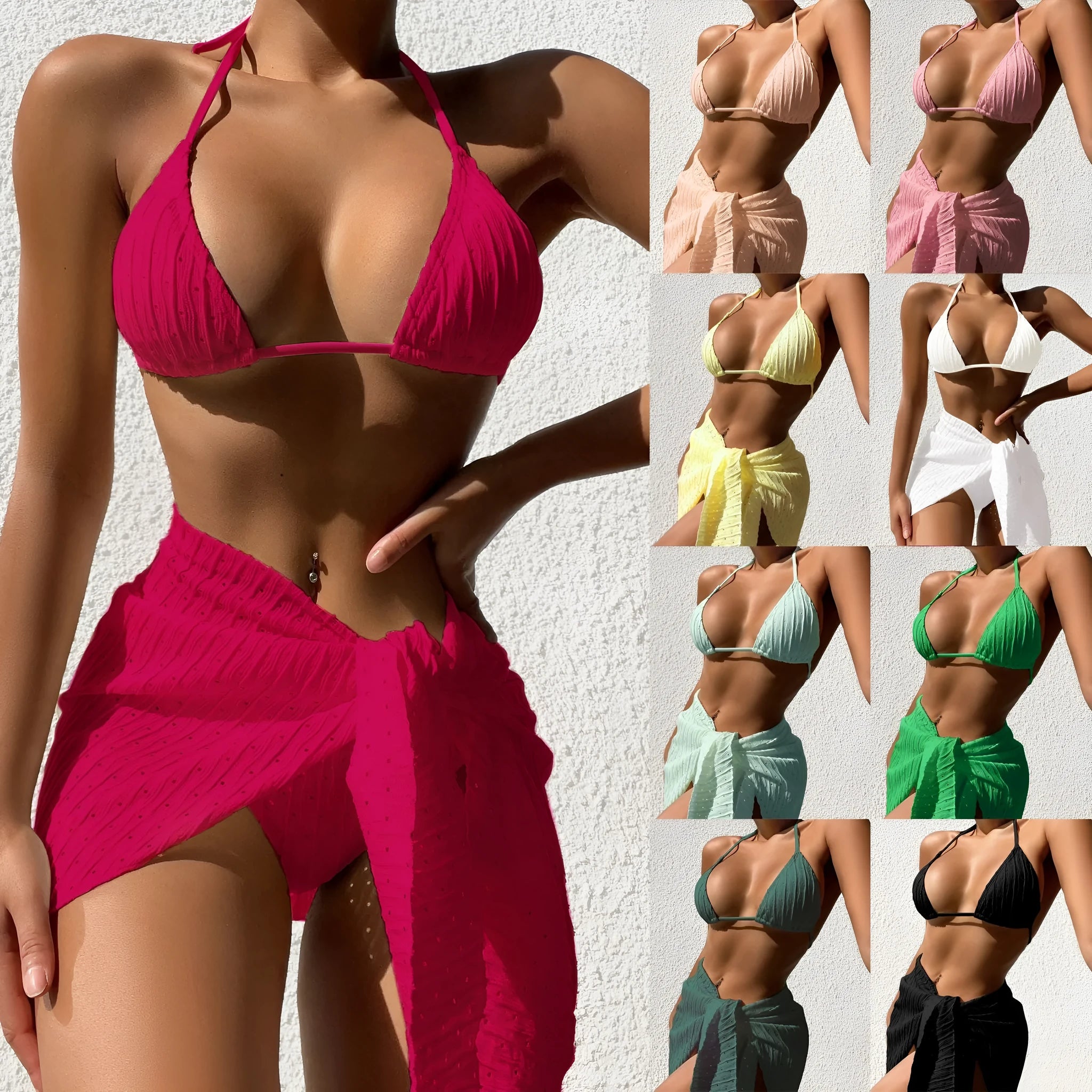 A woman wearing a halterneck backless bikini top with a matching mesh skirt, a 3-piece swimsuit set.