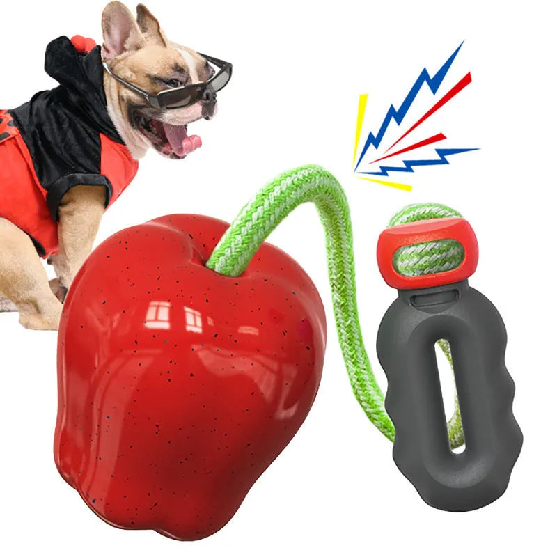 Green apple-shaped plastic dog chew toy with treat-dispensing opening