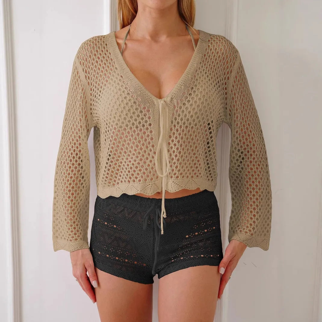 Short women's cardigan blouse with bell sleeves in hollow woven imitation cotton fabric.