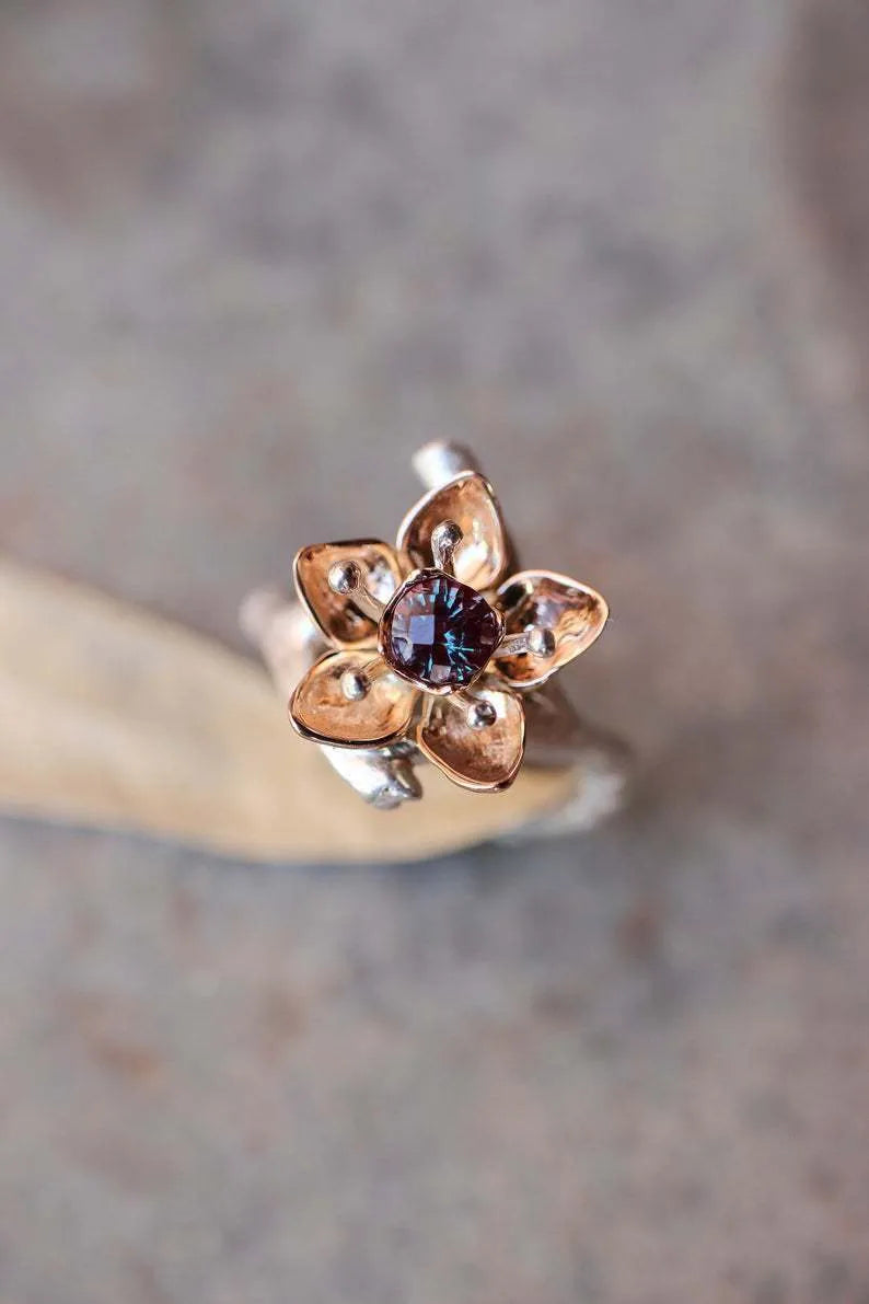 Silver two-tone floral geometric women's ring showing alloy construction and contemporary design
