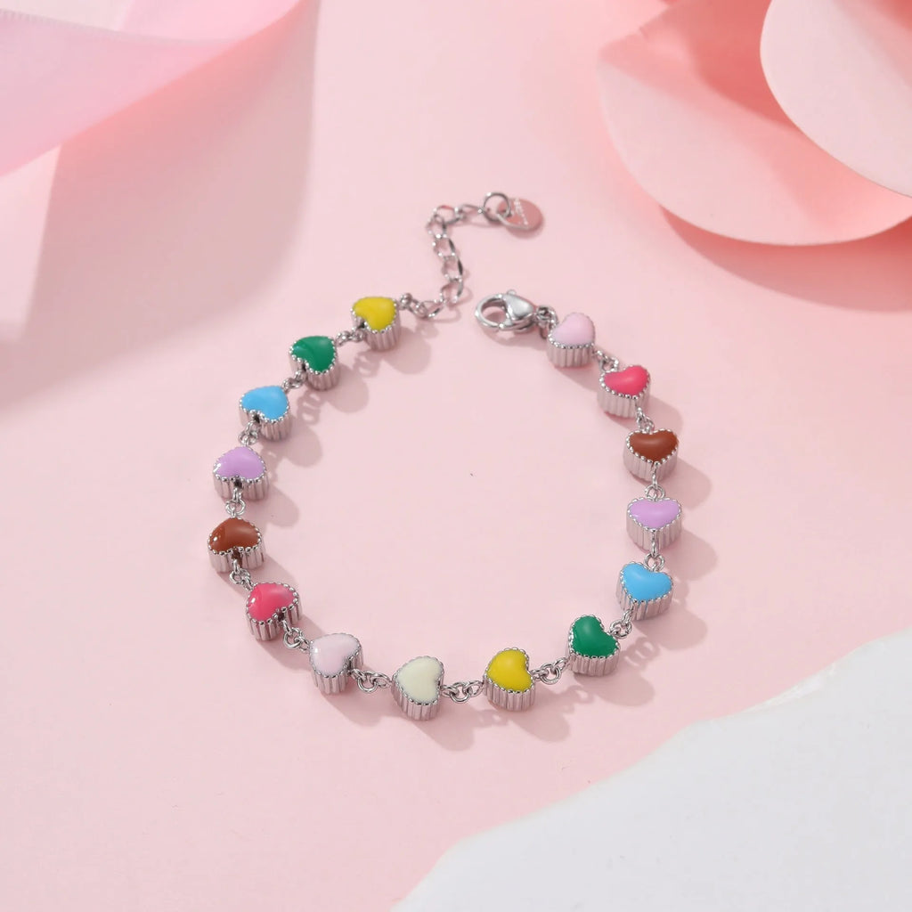 Women's heart-shaped titanium steel bracelet with 18K gold electroplating in gold or steel colour options