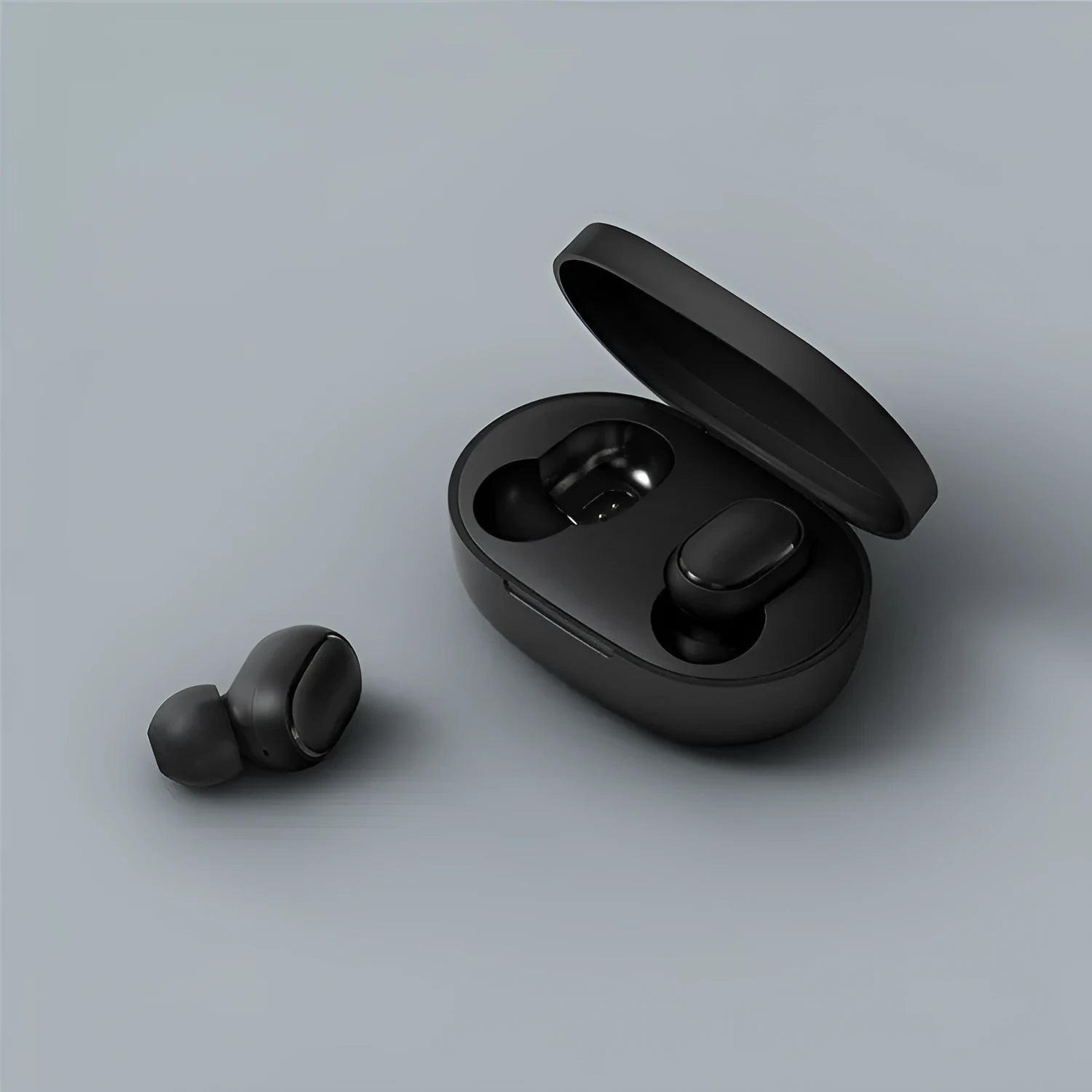 Redmi AirDots 2 Black true wireless earphones with their compact charging case.
