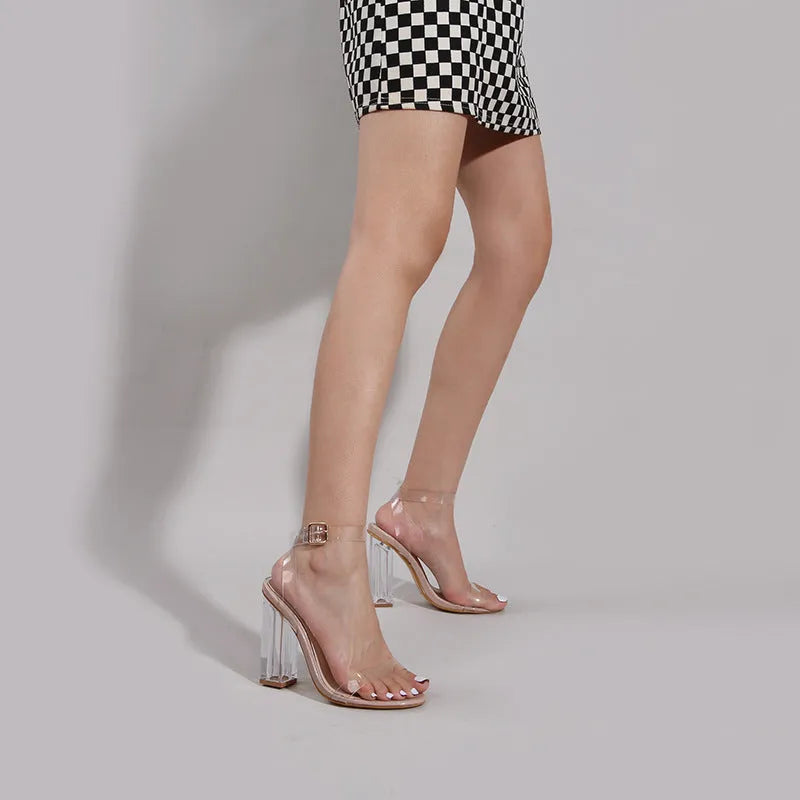 Women's apricot high heel sandals with clear PVC glass heels and buckle closure