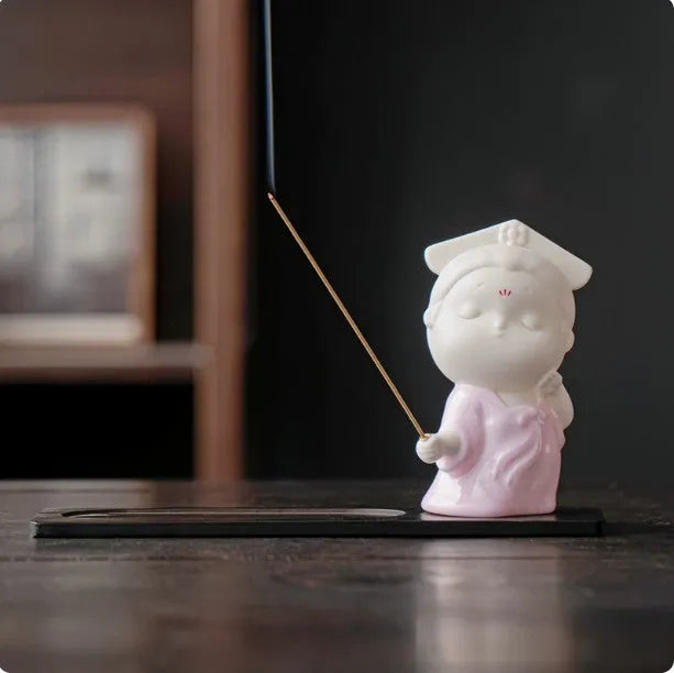Ceramic court attendant incense burner decoration in traditional colours