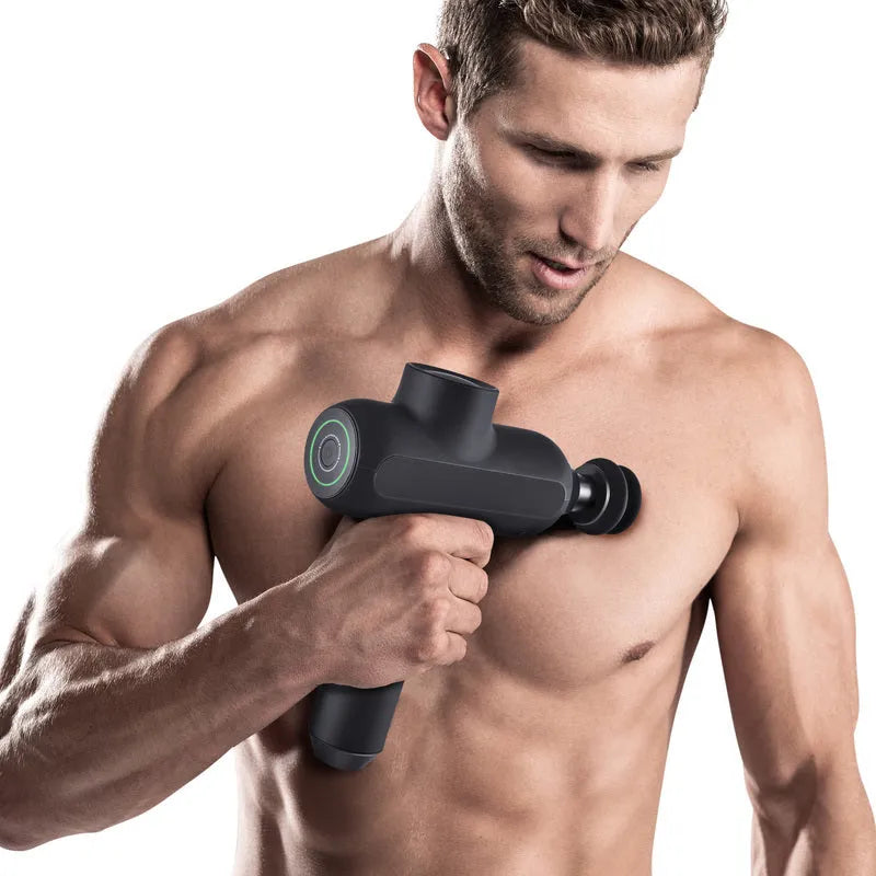 Deep tissue massage gun with six interchangeable heads showing compact 25x20x6cm design
