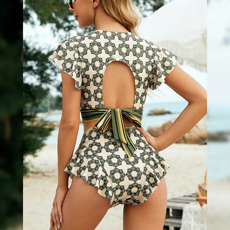 Green flounced backless lace-up V-neck split bikini swimsuit suit on model with polyester and spandex construction