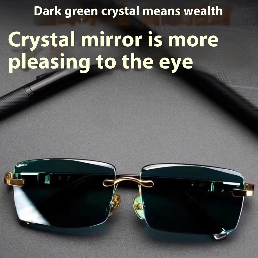 Dark green frameless crystal sunglasses with a glasses case and lens cloth.