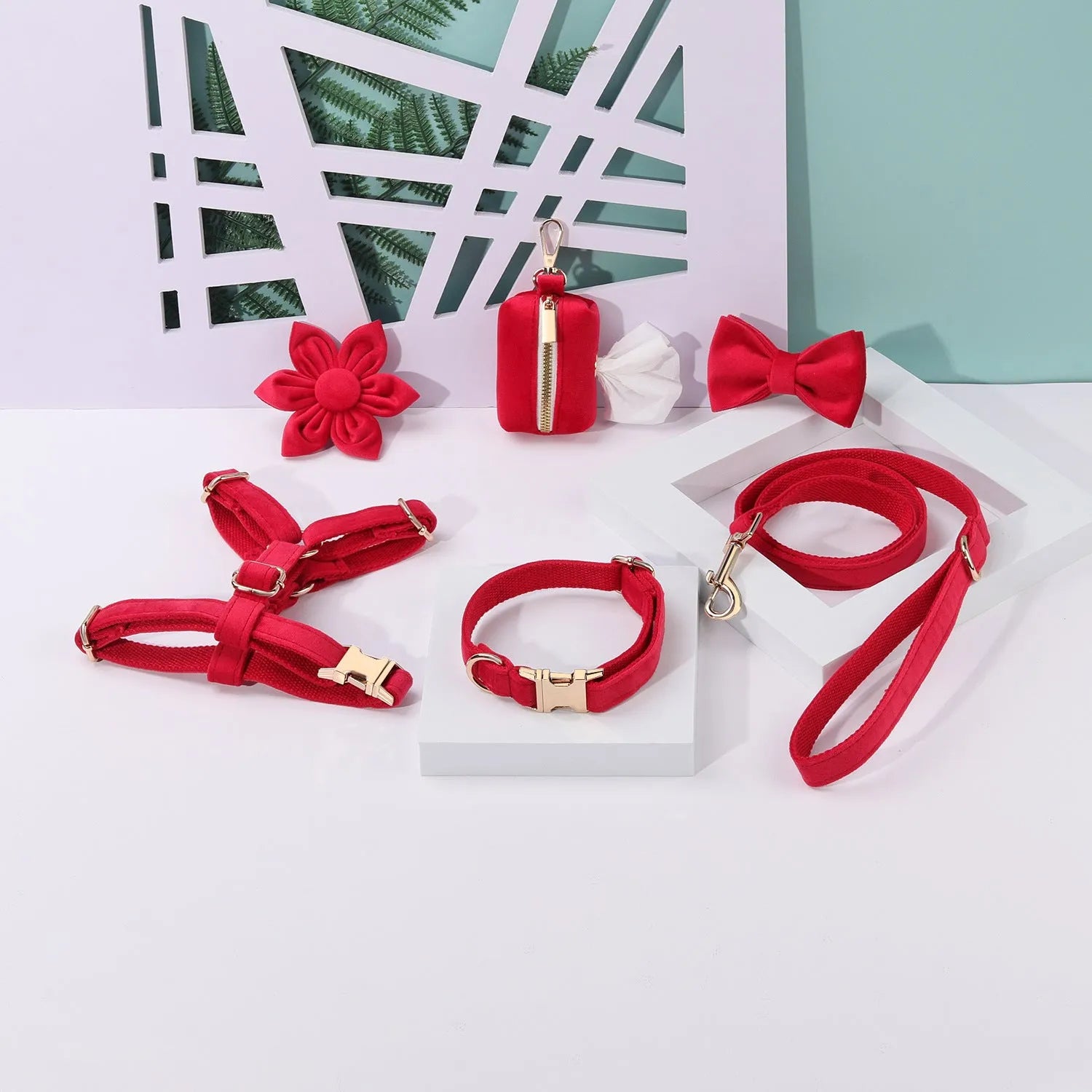 Soft cloth pet harness and lead set in velvet, showing collar, chest strap, lead, bow tie, and flower accessory.
