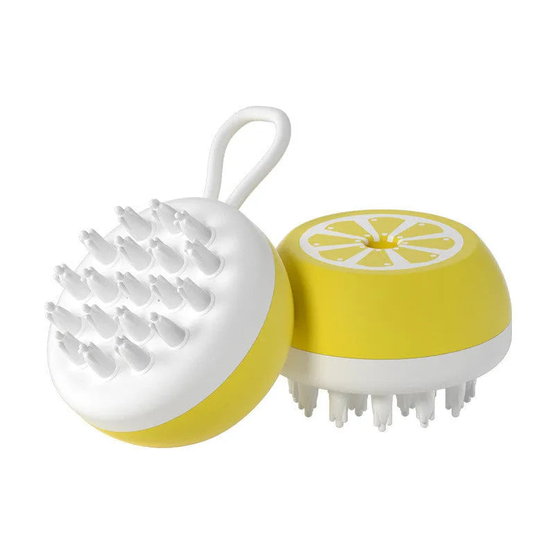 Yellow silicone pet bath brush with massage head for dog and cat grooming during bathing