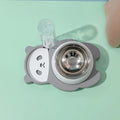 Grey panda-shaped automatic pet water dispenser with tilted stainless steel bowls for cats and small dogs