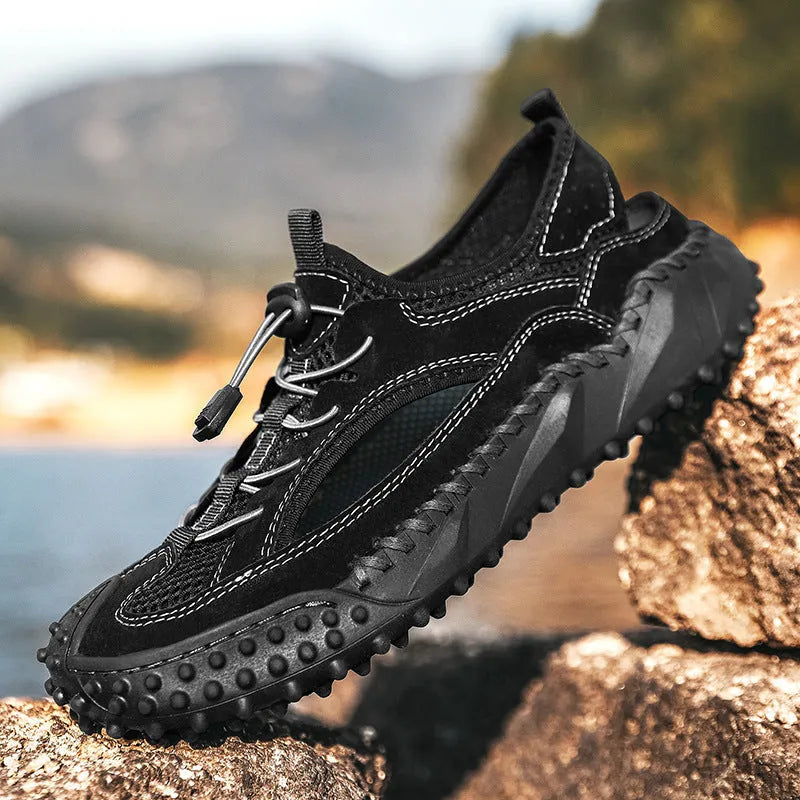 Men's black hollow sports sandals with leather mesh upper, rubber sole, and elastic band closure