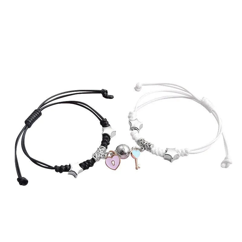 Magnetic couple bracelet pair with alloy electroplating in various designs including clover and crown patterns