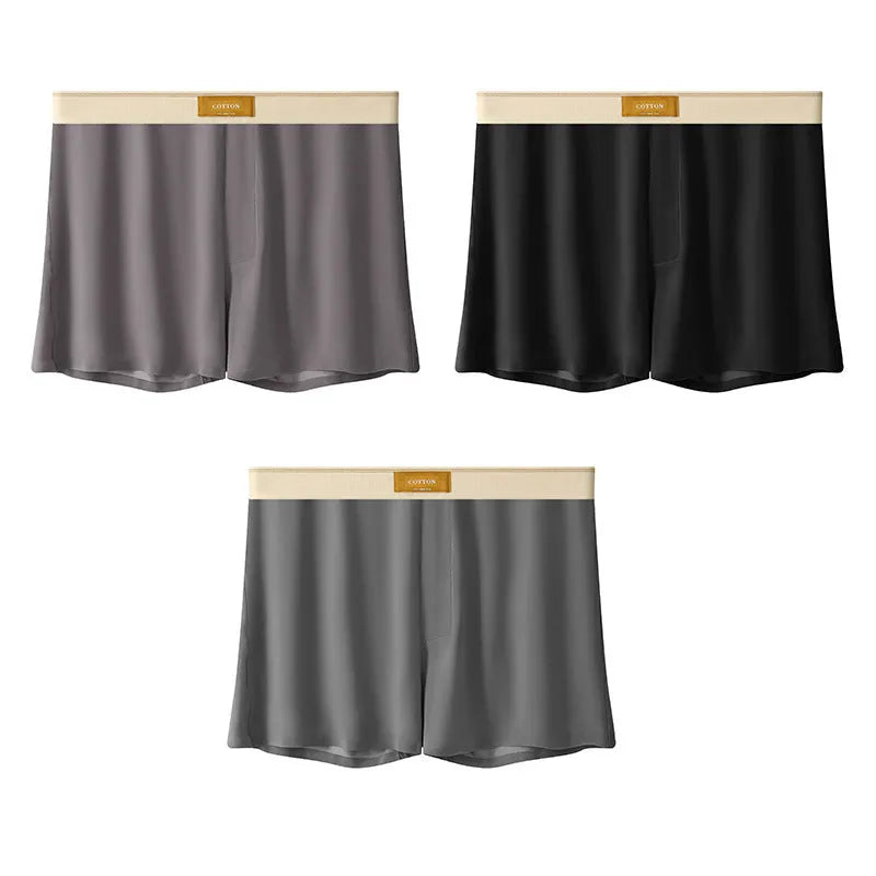 Men's loose fit ice silk underwear in solid colours showing mid-waist design and breathable fabric texture.