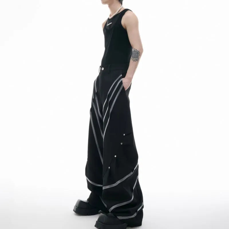 Men's black and white polyester trousers with three-dimensional cut and metal striped rivet pleats