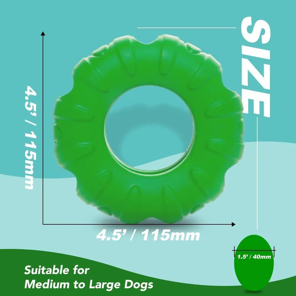 Blue rubber tyre-shaped dog chew toy with oval openings, shown next to dog treats.