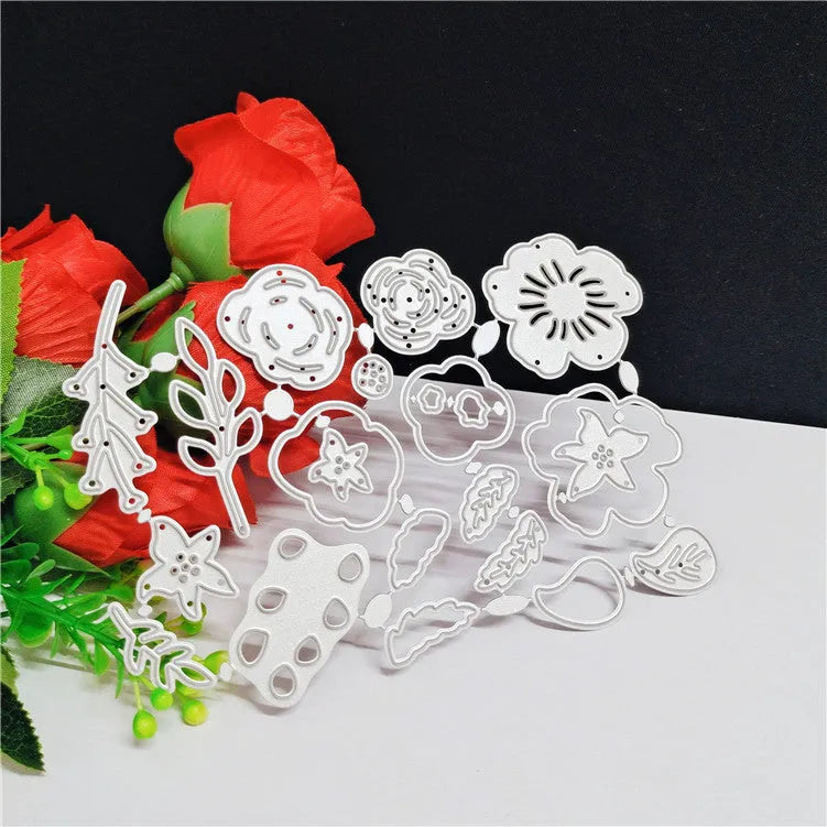 Silver carbon steel flower paper cutting knife mould measuring 14.3 by 9.9 cm