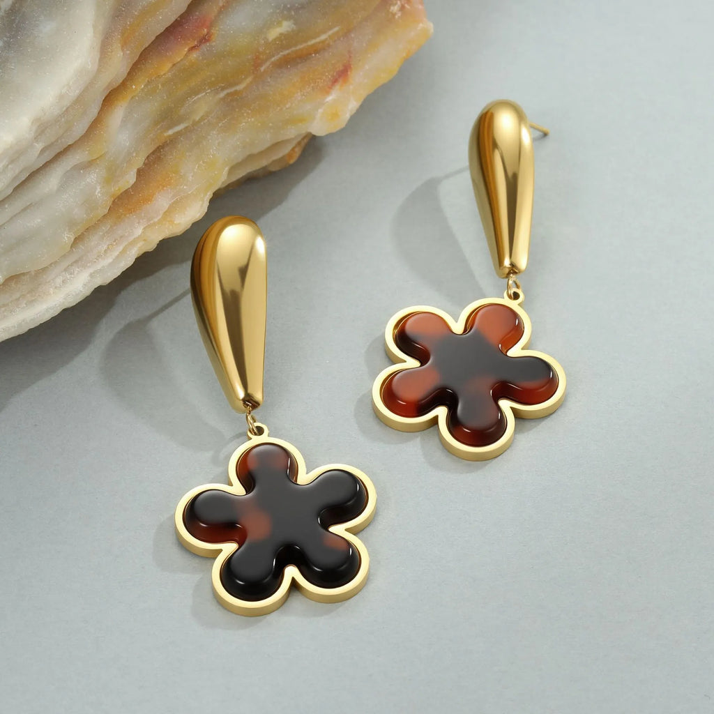 Tortoiseshell resin earrings with 18K gold electroplating in heart and flower geometric designs