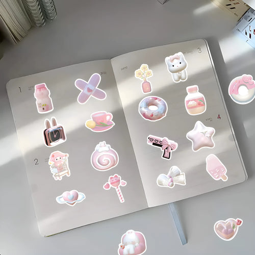 Pack of 63 pink heart-shaped 3D decorative stickers for crafts and laptop decoration.