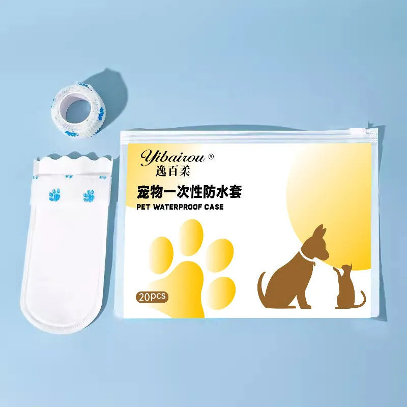 White disposable waterproof shoe covers for small and medium dogs on a non-slip surface.