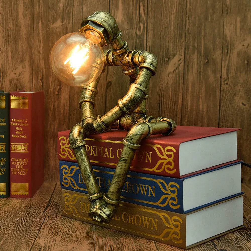 Robot vintage industrial table lamp with iron pipe construction in green bronze finish