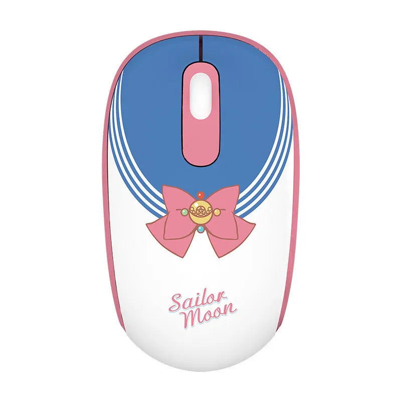 Pink Sailor Moon wireless computer mouse with USB receiver on desk