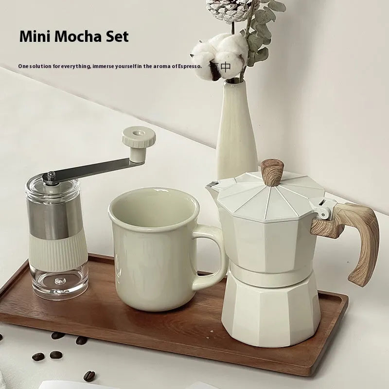 Manual grinding machine set six-piece moka pot kit in beige with grinder, cup, jar, brush, spoon and filter paper
