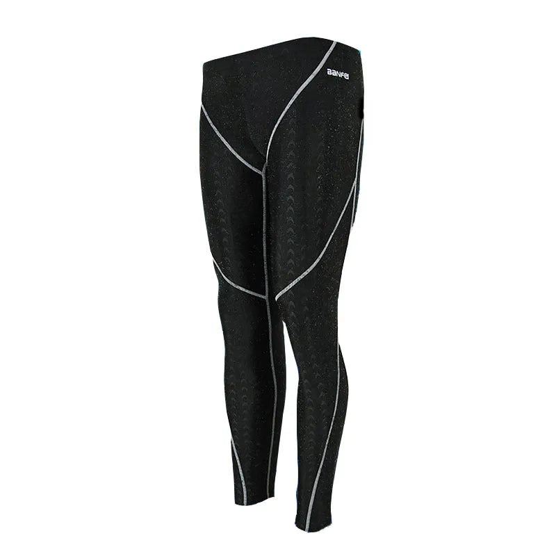 Men's nylon cropped swimming trunks in black with green line pattern