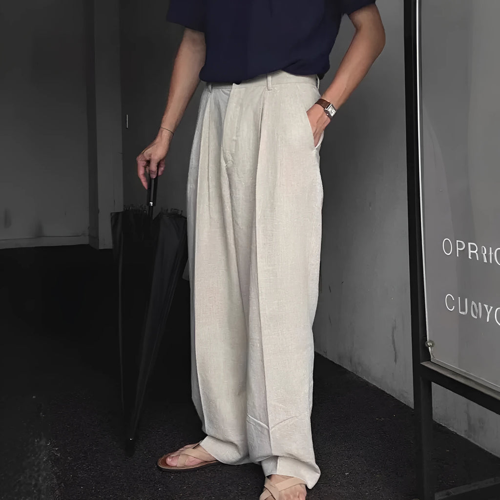 Men's lightweight cotton linen blend trousers in a loose fit, shown in apricot, army green, and purplish blue colours.