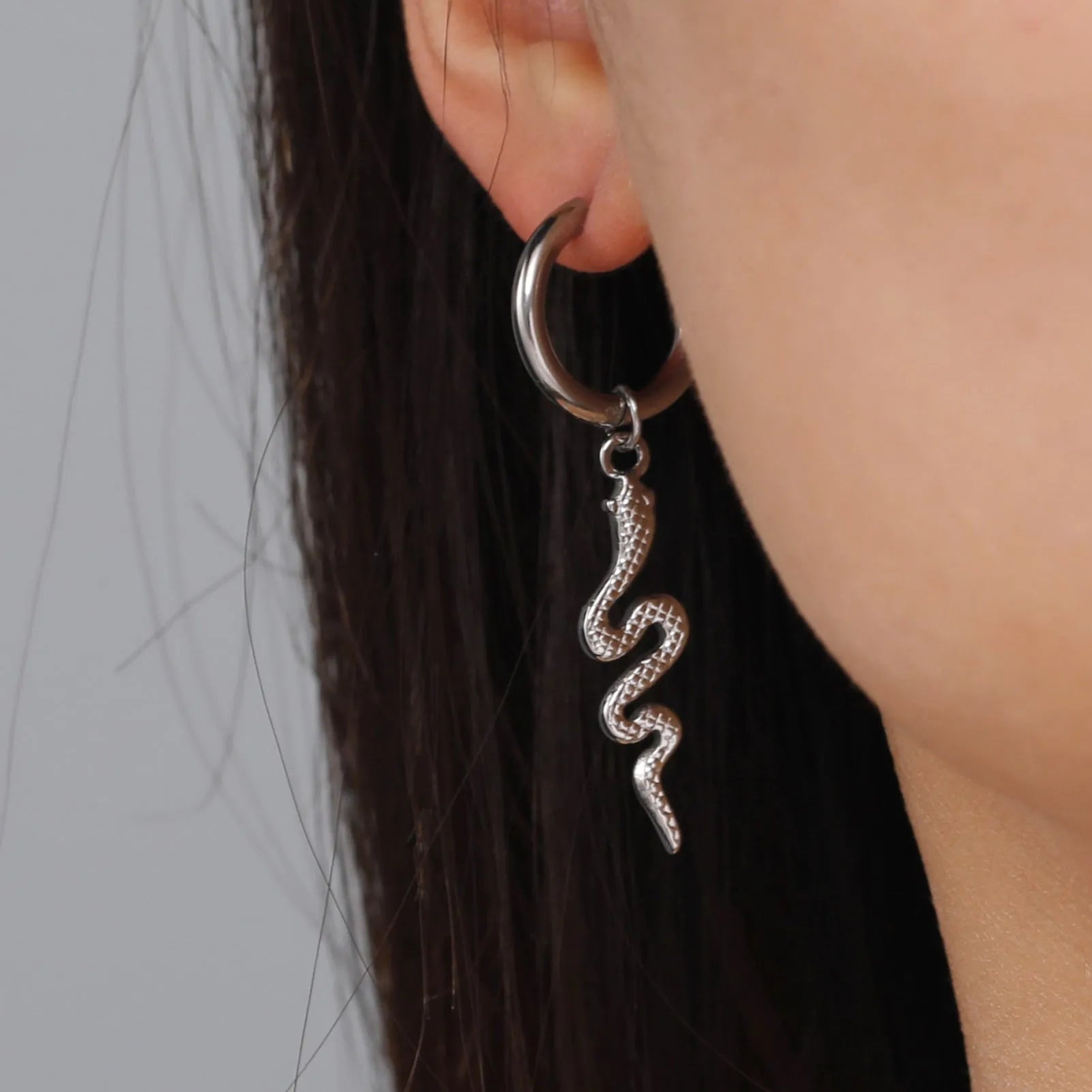 Gold plated snake-shaped vintage clip-on earrings with stainless steel construction