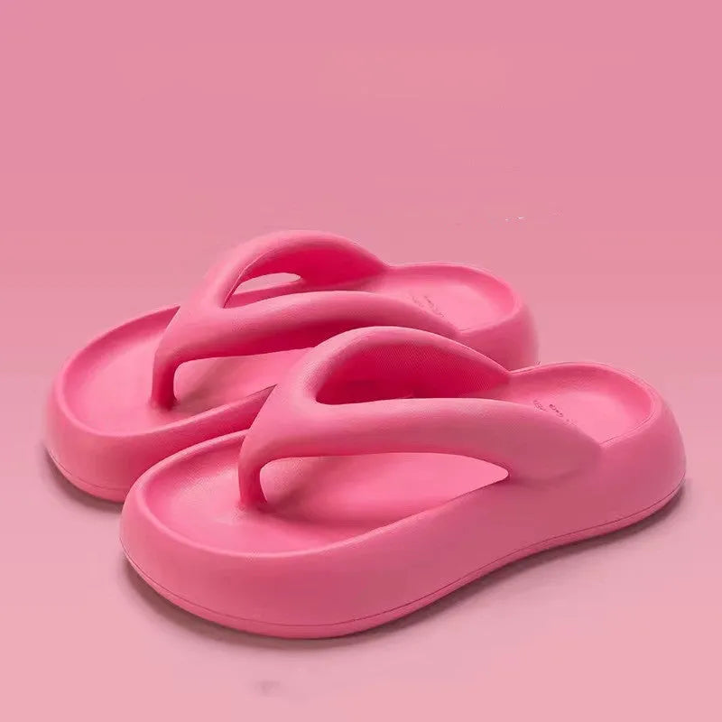 Women's thick-soled EVA flip-flops with a bow detail in assorted colours on a white background.