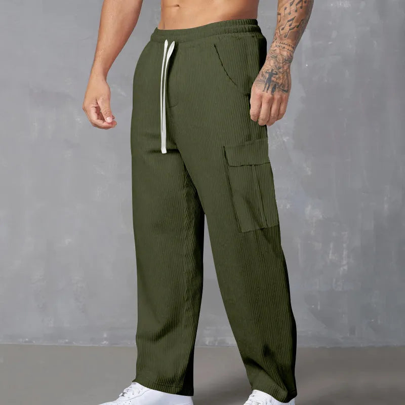 Men's straight-leg corduroy cargo trousers in navy blue with a drawstring waist.
