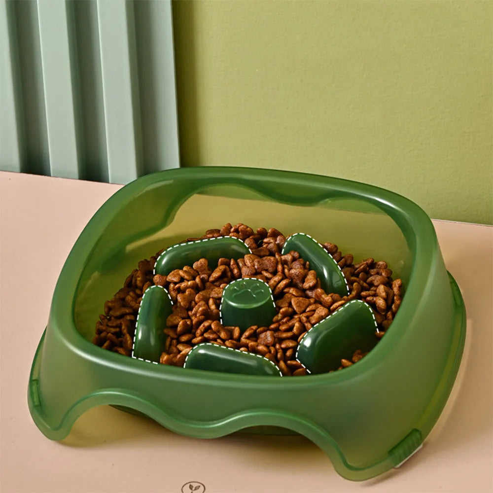Blue plastic dog slow feeder bowl with anti-choking design on white background