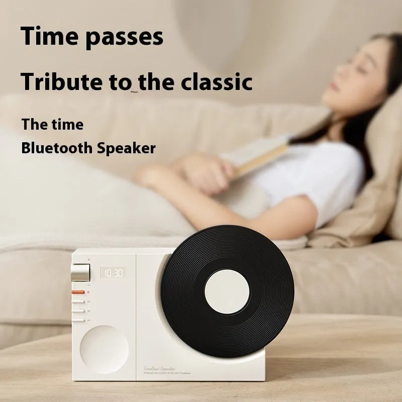 Mini Bluetooth portable speaker in Obsidian Black colour showing compact design with control buttons and card slot