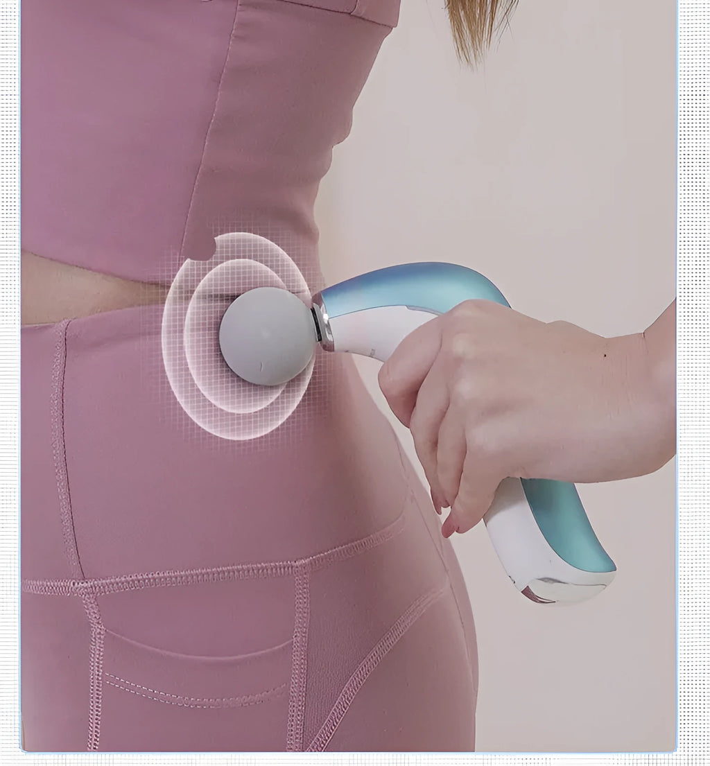 Mini electric massage gun with hot compress, LCD screen, and three massage heads in pink
