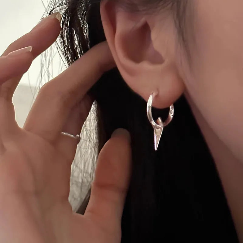 Geometric star shaped ear clips for women with electroplated copper construction and white gold plating