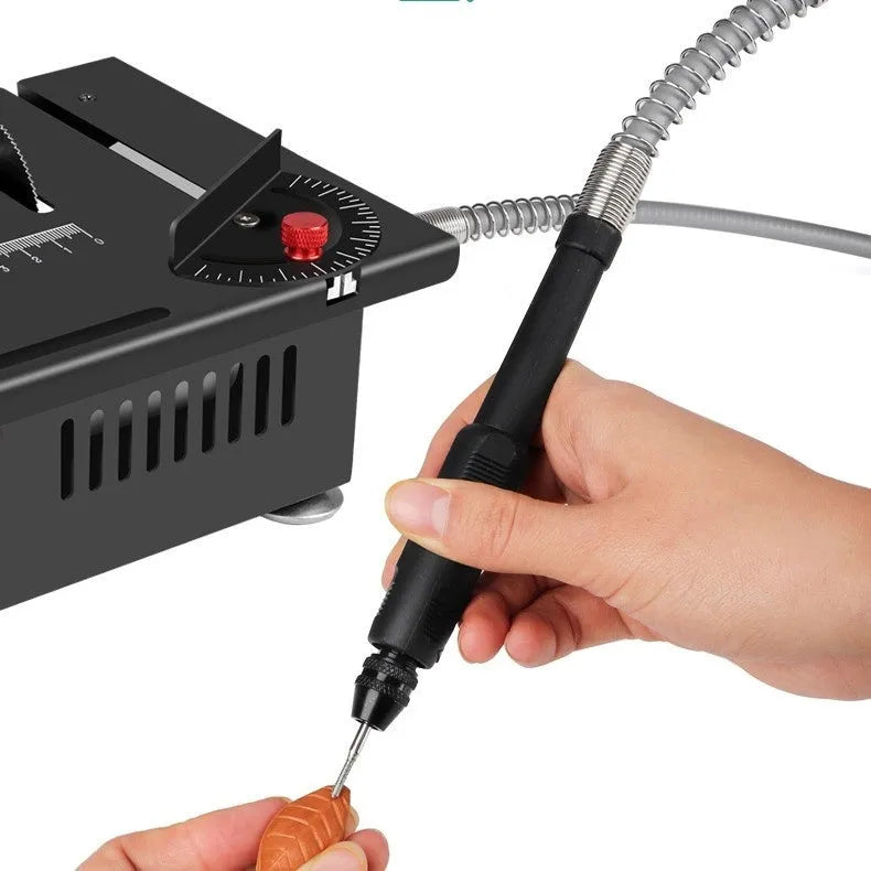 Lithium ion cordless micro desktop saw with metal body on a workbench