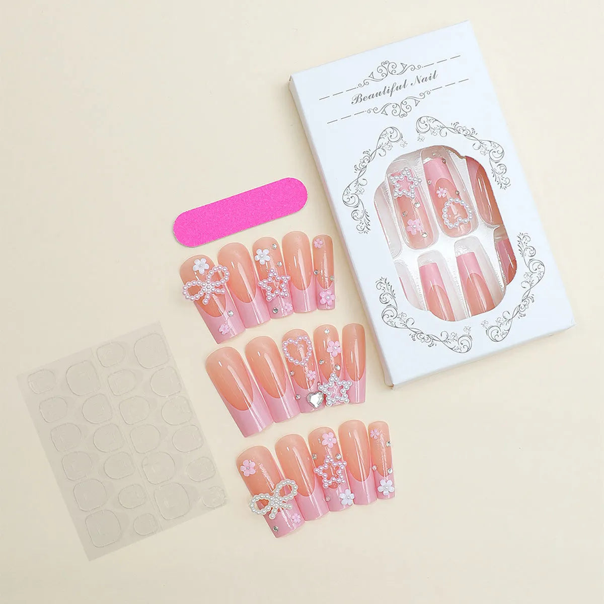Super long water pipe shaped false nails with a French spot design and decorative bow accent.