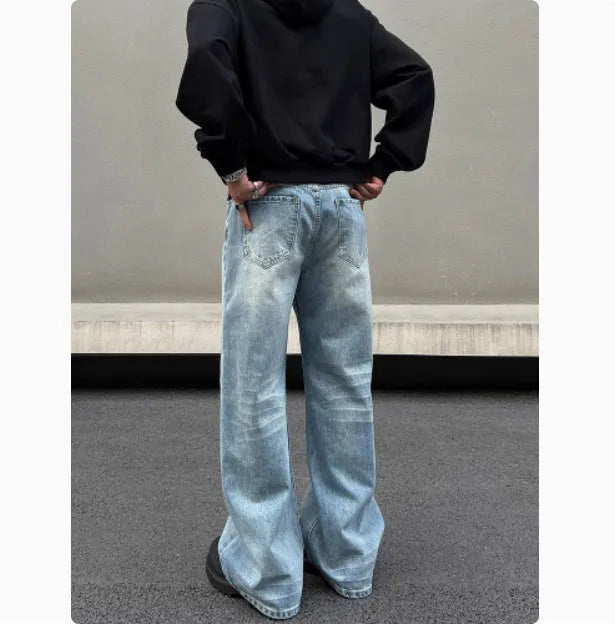 Men's blue retro whisker washed straight jeans with medium-high waist and visible stitching