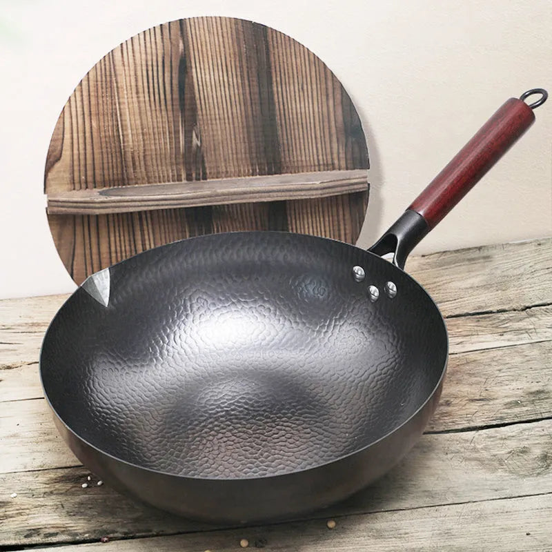 Traditional black iron wok pan with wooden handle and glass lid option