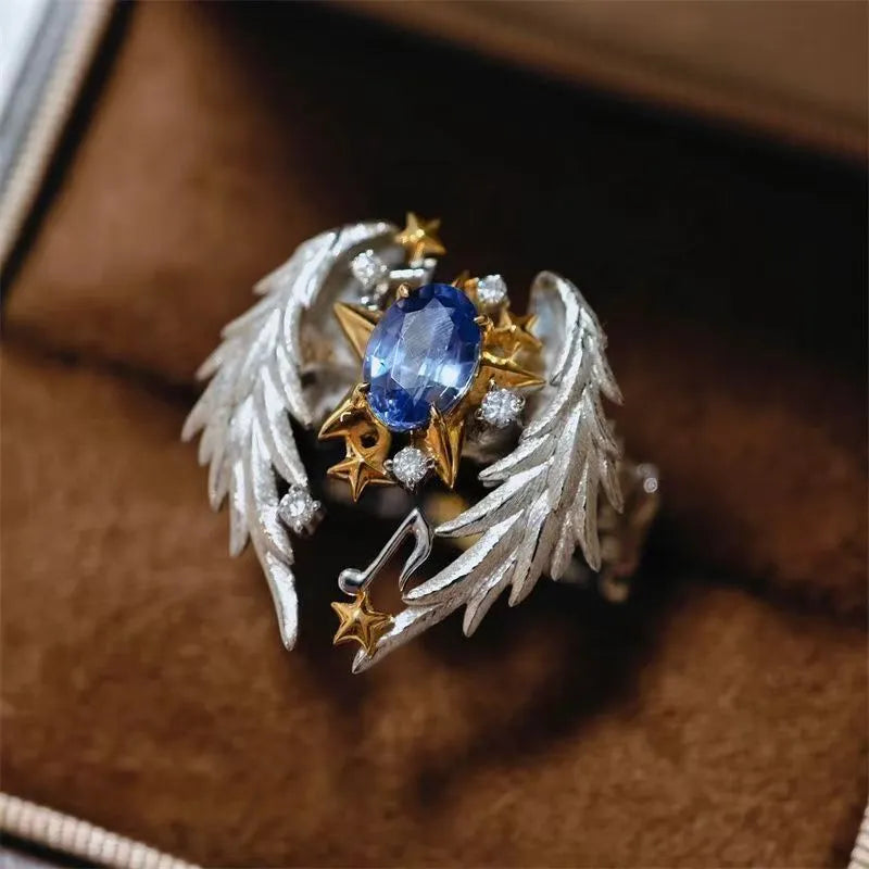 Adjustable geometric alloy ring with open mouth design and oiled finish