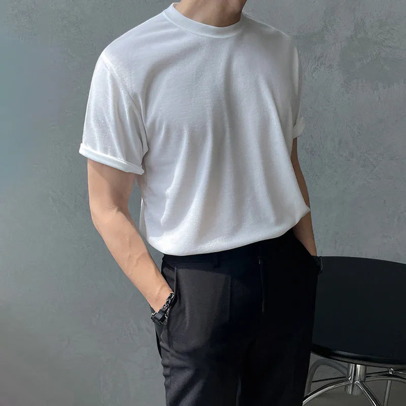 Men's slim fit cotton T-shirt in black or white with round neck and half sleeves