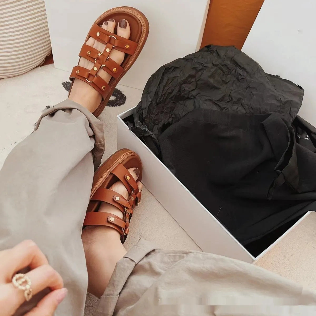 Women's white retro Roman-style sandal slippers with patent leather straps and sheepskin lining.