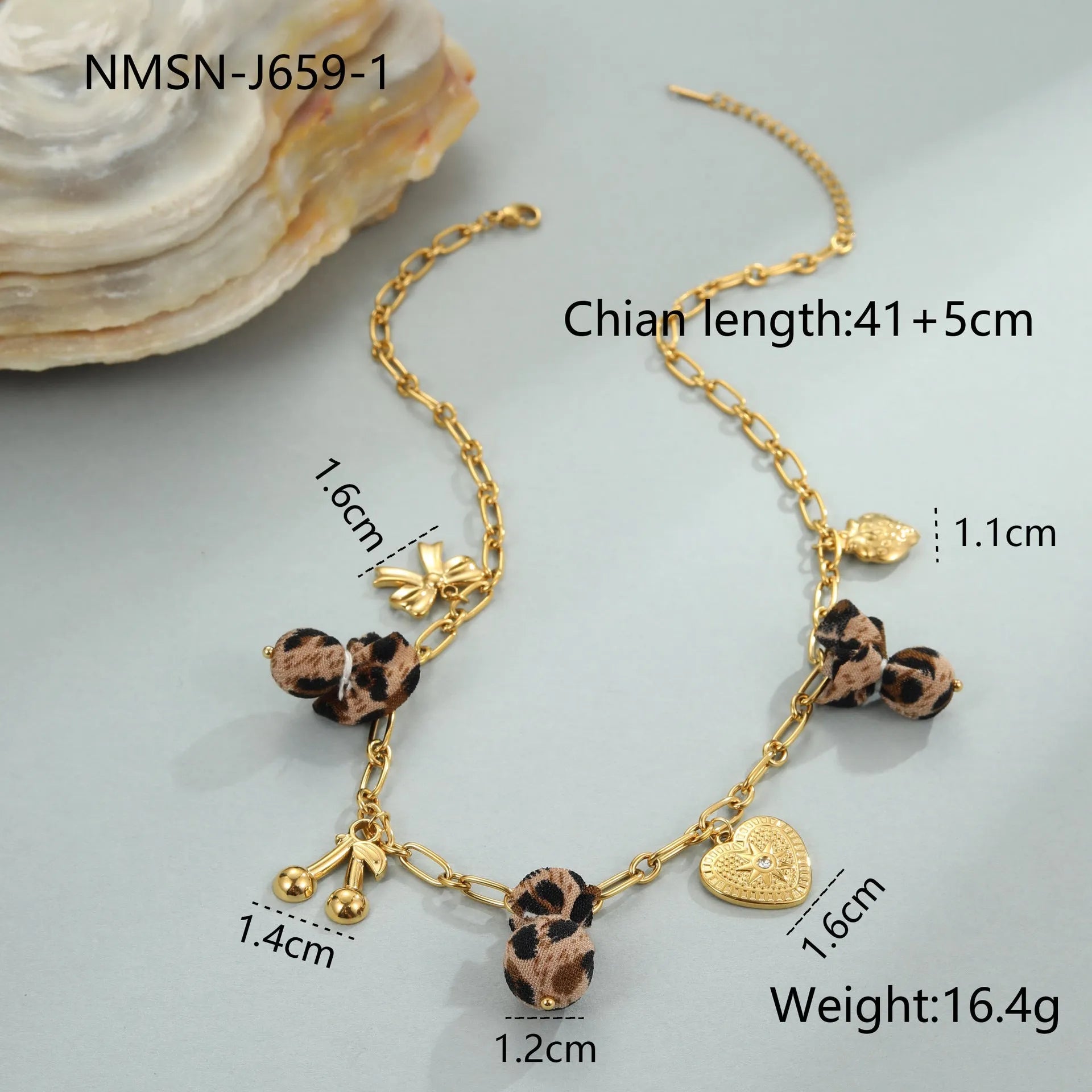 Gold-plated leopard pendant necklace with love heart and flower detailing on adjustable chain
