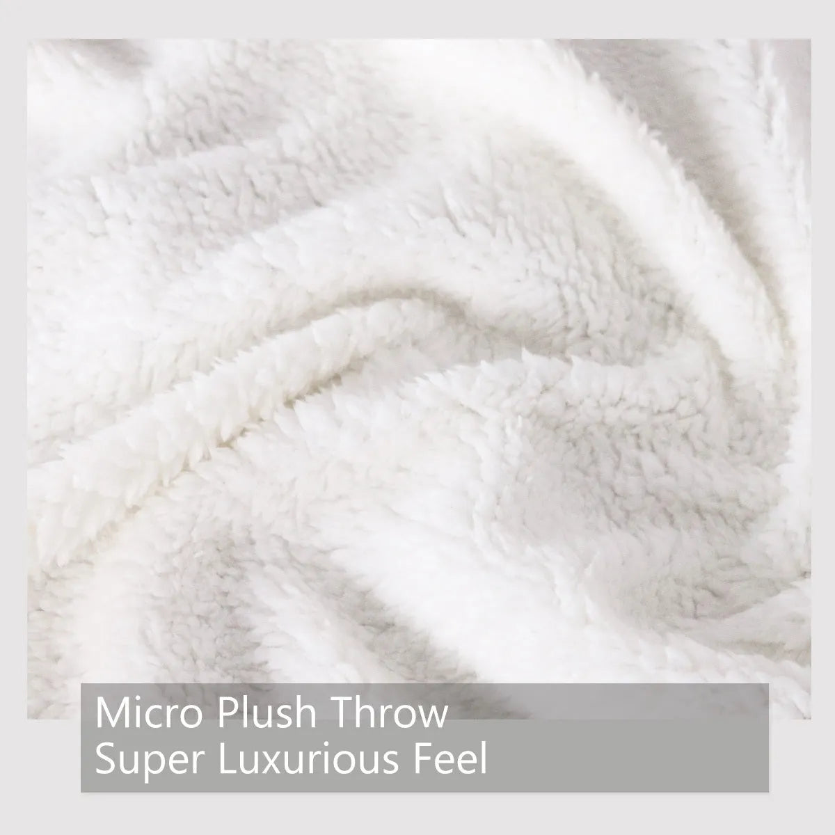 Brown sherpa fleece blanket with wolf head pattern, 150x200cm, on a couch